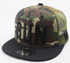 Detail of camouflage trucker hat featuring DON'T WALK BUT RUN embroidery and mesh back