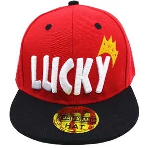 Red and black flat brim baseball cap for kids with white 3D LUCKY embroidery and crown