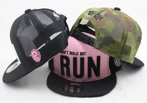 Detailed view of mesh back trucker hats with RUN embroidery and adjustable snapback