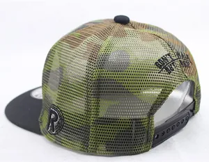 Close-up of camouflage mesh trucker hat with adjustable plastic snap and RUN embroidery
