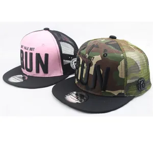 Kids camo and pink mesh baseball caps with RUN embroidery in a flat layout view