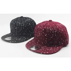 Kids streetwear snapback baseball caps with white paint splatter pattern in black and burgundy