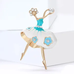 Elegant ballerina brooch with light blue enamel and sparkling crystal accents on gold plating