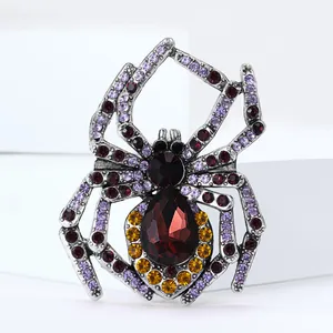 Vintage-Spinne-Brosche mit roten Strasssteinen auf weißem Stein für Halloween-Stil