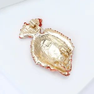 Unique fish enamel brooch with gold-tone finish and secure pin clasp for clothing