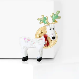 Elegant Christmas reindeer brooch with white sequins, green antlers and a red scarf