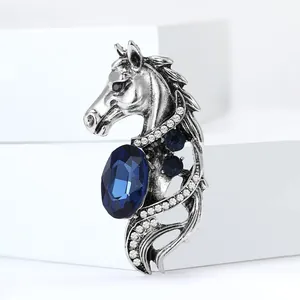 Elegante spilla a testa di cavallo vintage con pietra blu navy e cristalli in argento retrò