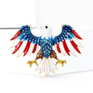 Eagle brooch with enamel red white and blue flag colors and gold-plated details