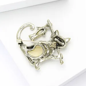 Detailed back view of vintage gold cat brooch showing secure pin fastener and metal finish