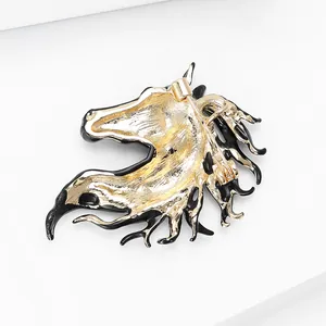 Detailed back view of horse head brooch showing the golden pin clasp mechanism
