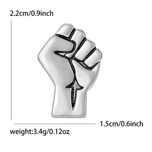 Retro silver fist lapel pin with black antique finish for suits, size 2.2cm by 1.5cm