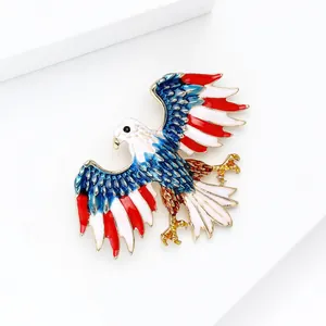 Detailed close-up of eagle brooch featuring red white and blue enamel on gold alloy