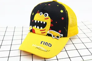 Detail of kids baseball cap featuring yellow mesh and cartoon dinosaur embroidery