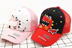Detail of kids baseball mesh caps with cute dinosaur embroidery and FIND text logos
