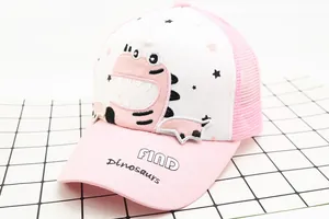 Detail of kids pink mesh baseball cap featuring cute dinosaur print and FIND text