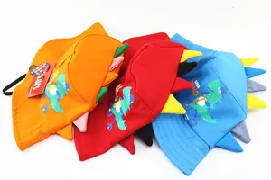 Detailed view of colorful children's cotton sun hats with 3D dino fins and cute prints