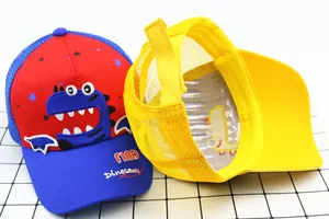 Detail of dinosaur embroidery and breathable mesh on children's baseball sun cap