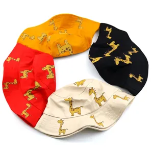 Foldable kids giraffe bucket hats in red, yellow, black and beige cotton fabric