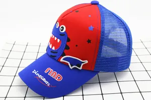 Detail showing the red cartoon dinosaur print and blue mesh of the kids baseball hat