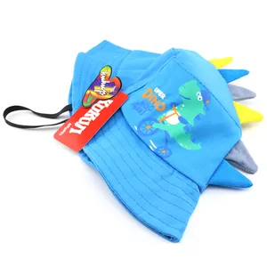 Blue kids bucket hat with cartoon dinosaur print and fun 3D spines for sun protection