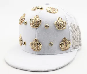 Detail of white mesh trucker hat with gold crowns and sparkling rhinestone accents