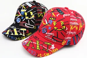 Detail showing graffiti print on black and red cotton canvas baseball caps for kids