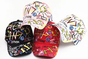 Group shot of colorful graffiti street style baseball caps in black, pink, red, and white