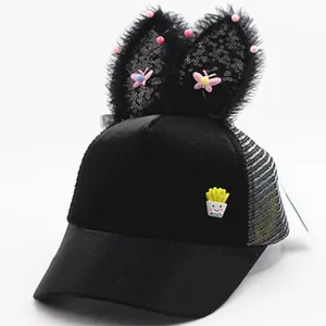 Kids black baseball cap with sequin bunny ears and potato patch on white background