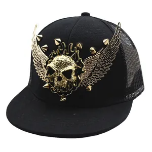 Kids black snapback hat with golden skull wings and studs on flat brim mesh cap
