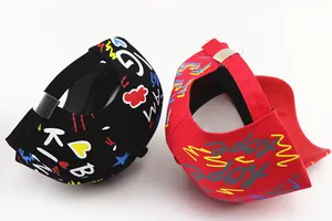 Detail of adjustable metal buckle and graffiti print on cotton baseball caps