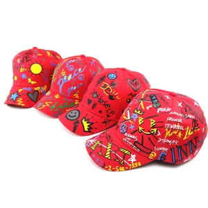 Kids red graffiti baseball cap with colorful letter prints and street art design