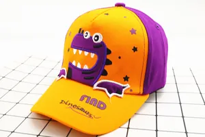 Detail of kids baseball cap featuring 3D dinosaur embroidery and Find Dinosaurs text