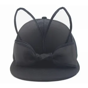 Black kids baseball cap with cute bunny ears and a large bow in street style design