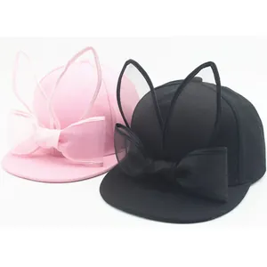 Cute kids baseball cap featuring 3D mesh rabbit ears and mesh bow in pink and black