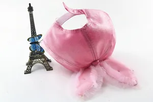 Detail of pink satin baby hat featuring cute rabbit ears with mesh lace and pearl accents