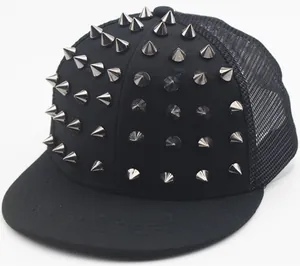 Detail of black mesh snapback cap featuring silver punk metallic spikes and studs