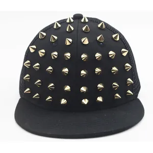 Hip hop style black mesh baseball cap with gold rivet studs and flat brim design