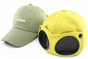 Detail of pilot-style kids baseball cap with goggles and Forever embroidery