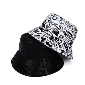 Chapeaux bob en toile style urbain avec imprimé graffiti en noir et blanc