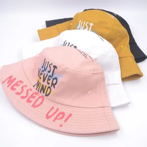 Graffiti bucket hats in pink white yellow black with Just Never Mind text design