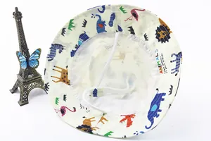Detail of baby sun hat showing breathable mesh lining and adjustable chin strap