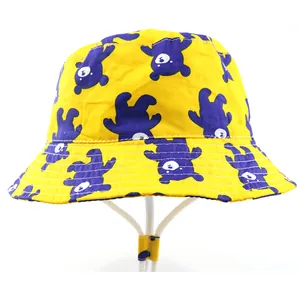 Breathable yellow cotton sun hat for kids featuring purple cartoon bear patterns and wind strap