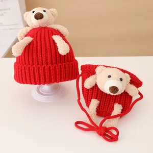 Red knit baby hat and shoulder bag set with cute plush teddy bear decorations