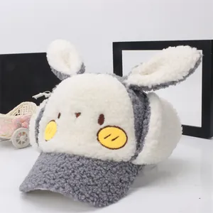 Winter plush trapper hat for kids featuring cartoon rabbit ears and earflaps