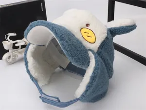 Detail of blue and white winter trapper hat with soft sherpa fleece and ear flaps