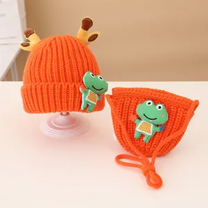 Winter knit baby hat and bag set featuring cute cartoon deer horns and frog patch