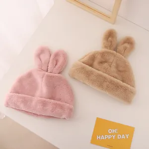 Winter plush baby hats with cute rabbit ears in pink and khaki soft faux fur