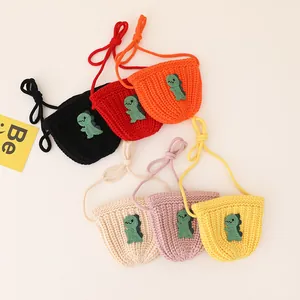 Mini crochet dinosaur crossbody bags for kids in six vibrant colors with cute 3D patches