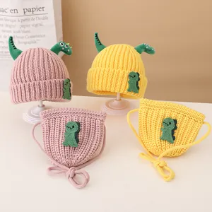 Kids knitted dinosaur hat and scarf set in pink and yellow for autumn winter warmth