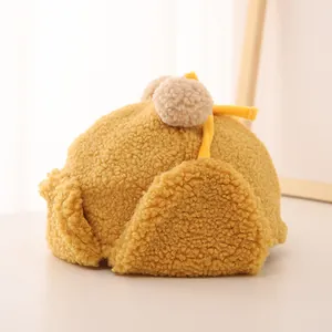 Kids warm yellow fleece earflap hat with double pom poms and soft chin straps